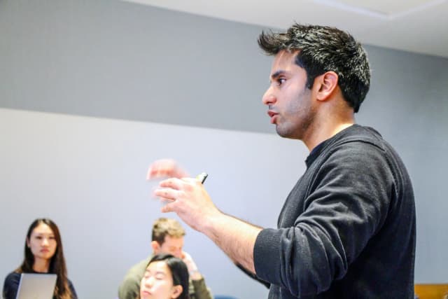 Hassan Akram delivering an MIT Sloan classroom session