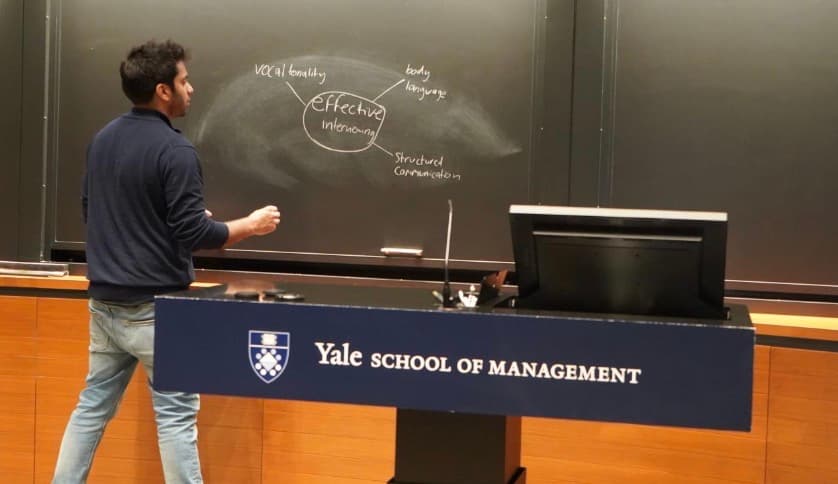 Hassan Akram delivering a career strategy session at a Yale School of Management MBA student club